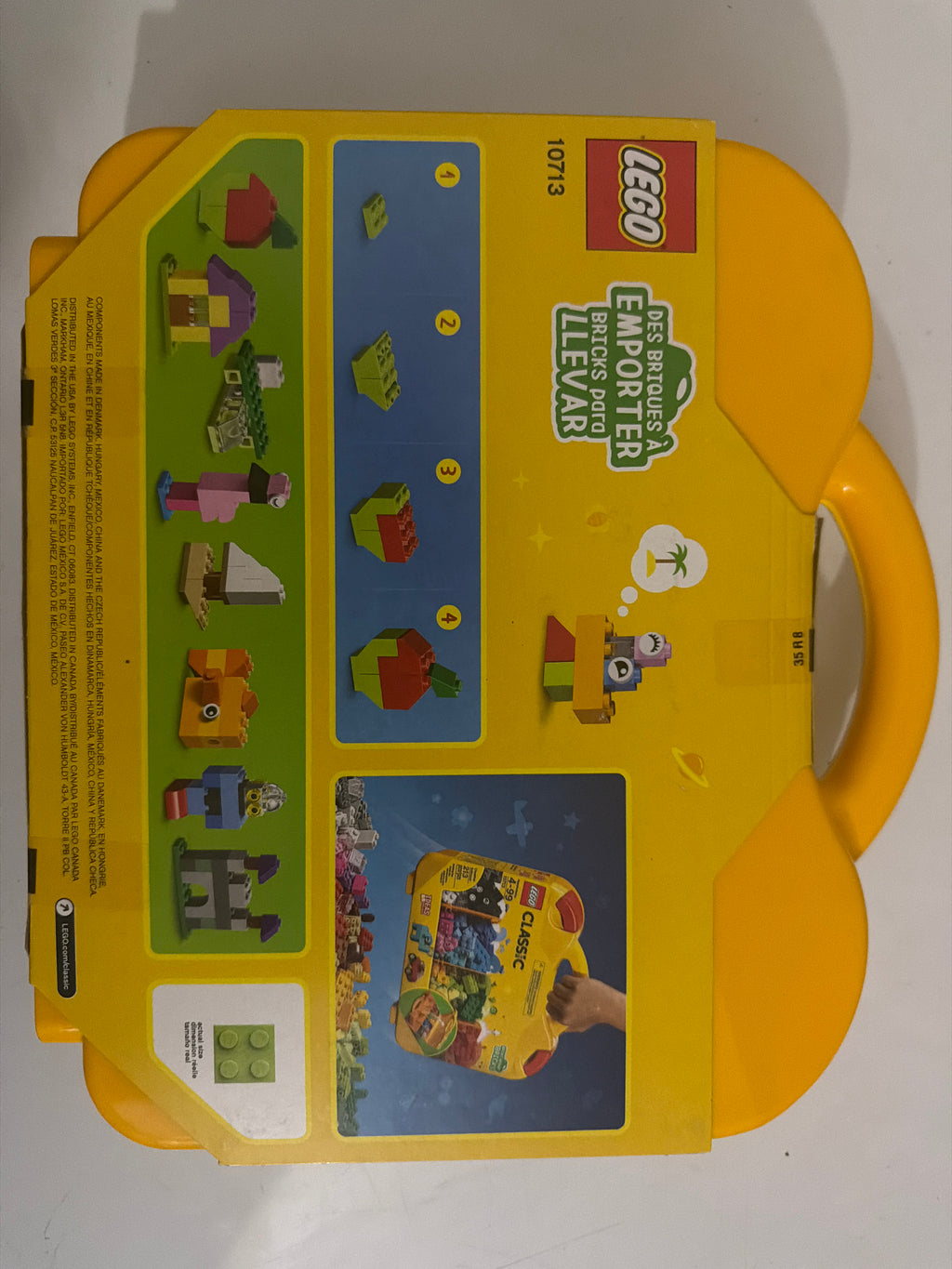 LEGO Classic 10713 – Creative Suitcase. “Missing one red locking tab but is sealed set”