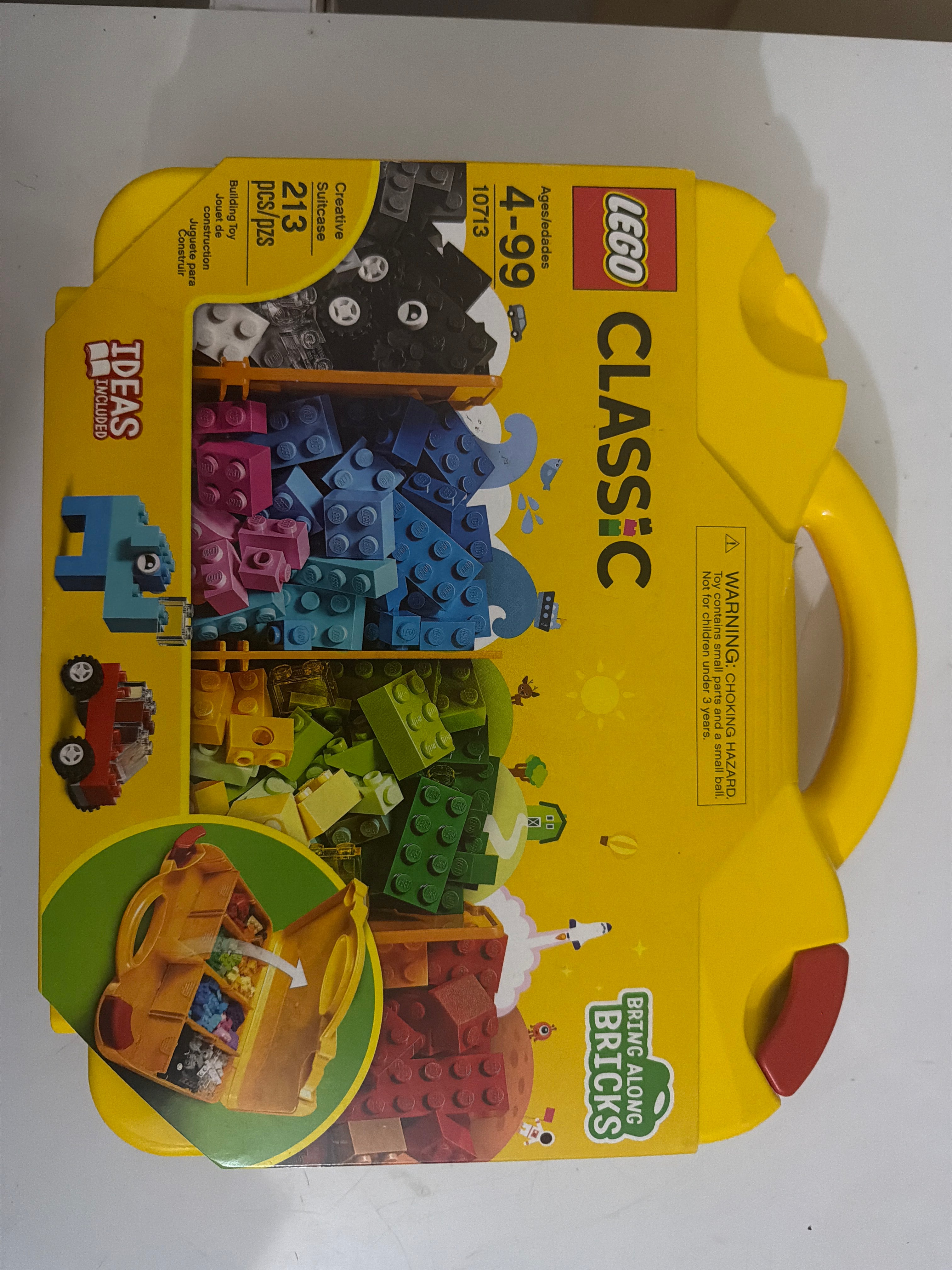 LEGO Classic 10713 – Creative Suitcase. “Missing one red locking tab but is sealed set”